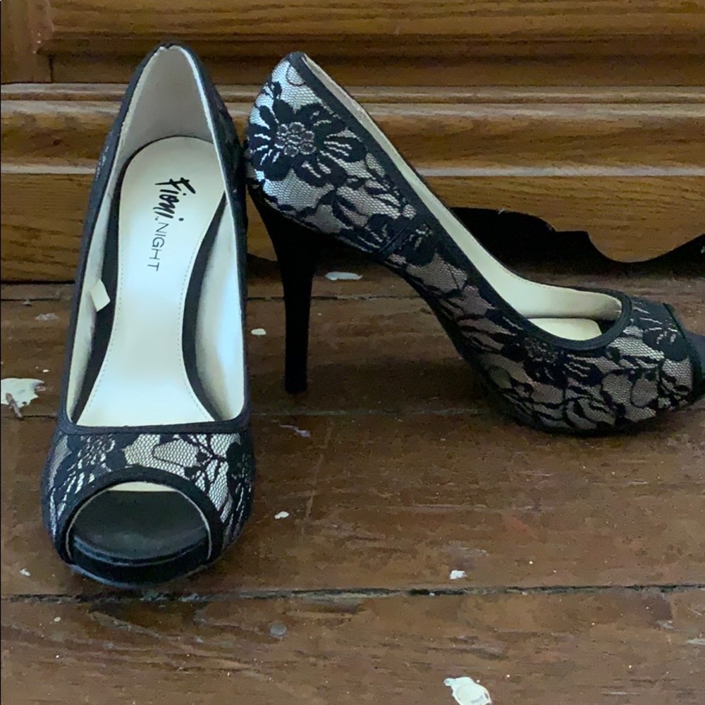 4” in heels with a floral design in black lace